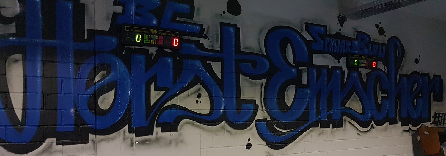 Interior graffiti wall with blue lettering in the billiards club